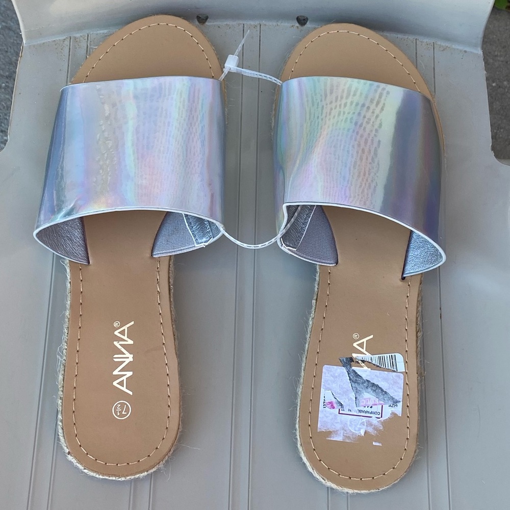 Silver sandals in 6.5 size, new